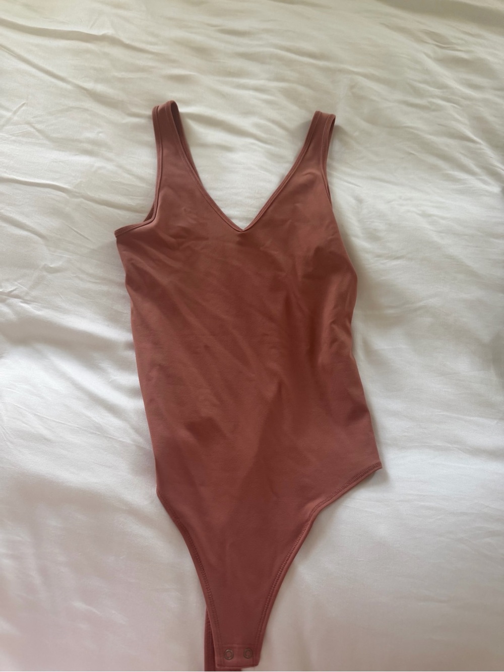 Womans Mauve One-Piece Bodysuit
